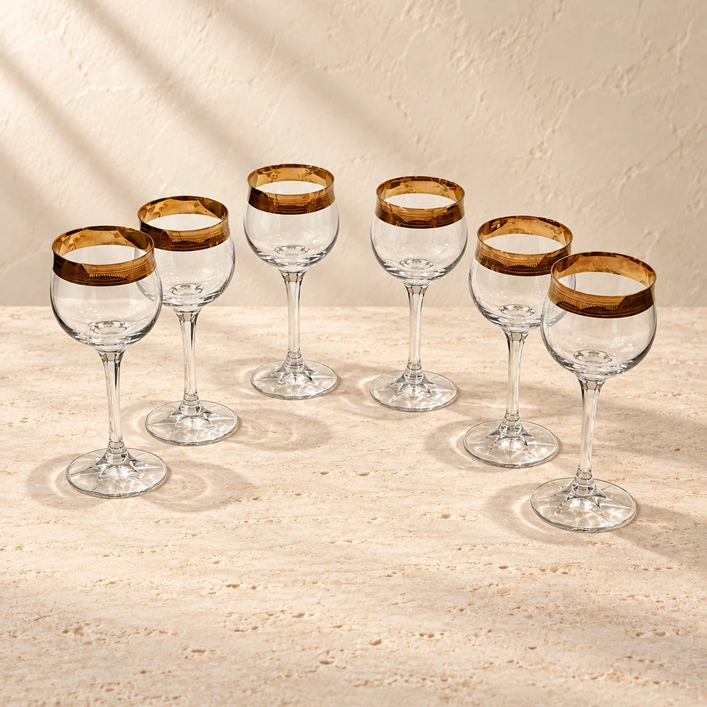 Theresienthal Concord Crystal Wine Glasses with 24K Gold Minton Rim — Set of 6 styled on a warm ivory background