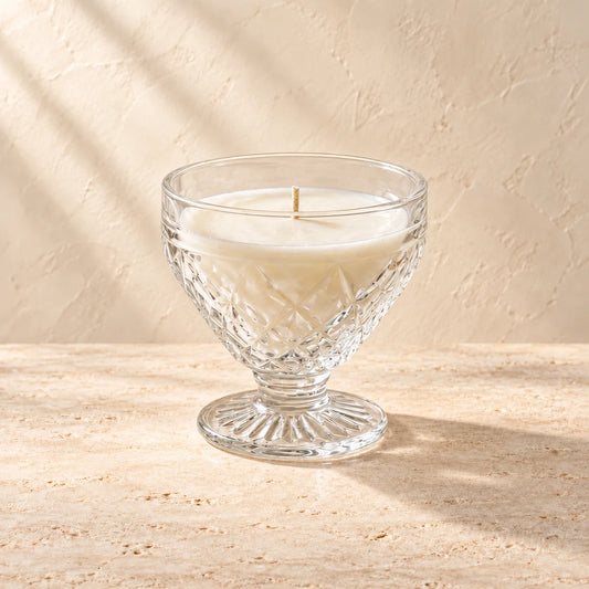Petal | Vintage Cut Crystal Sherbet Coupe candle styled on a warm ivory background