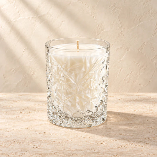Petal | Vintage Cut Crystal Rocks Glass candle styled on a warm ivory background