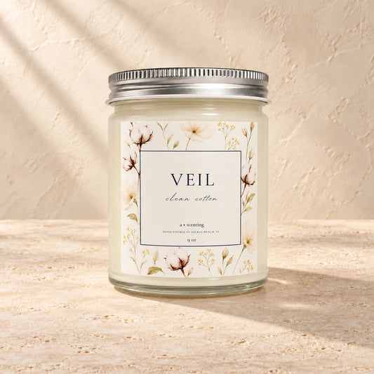 Veil | Clean cotton candle styled on a warm ivory background