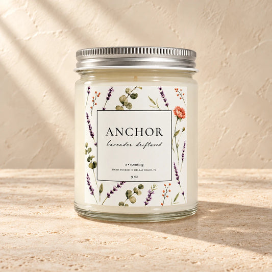Anchor | Lavender driftwood candle styled on a warm ivory background
