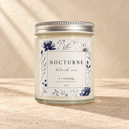 Nocturne | Black Sea candle styled on a warm ivory background