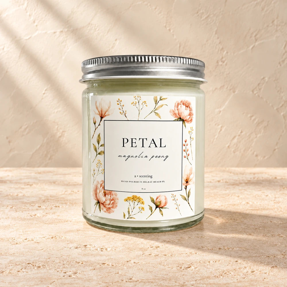 Petal | Magnolia peony candle styled on a warm ivory background