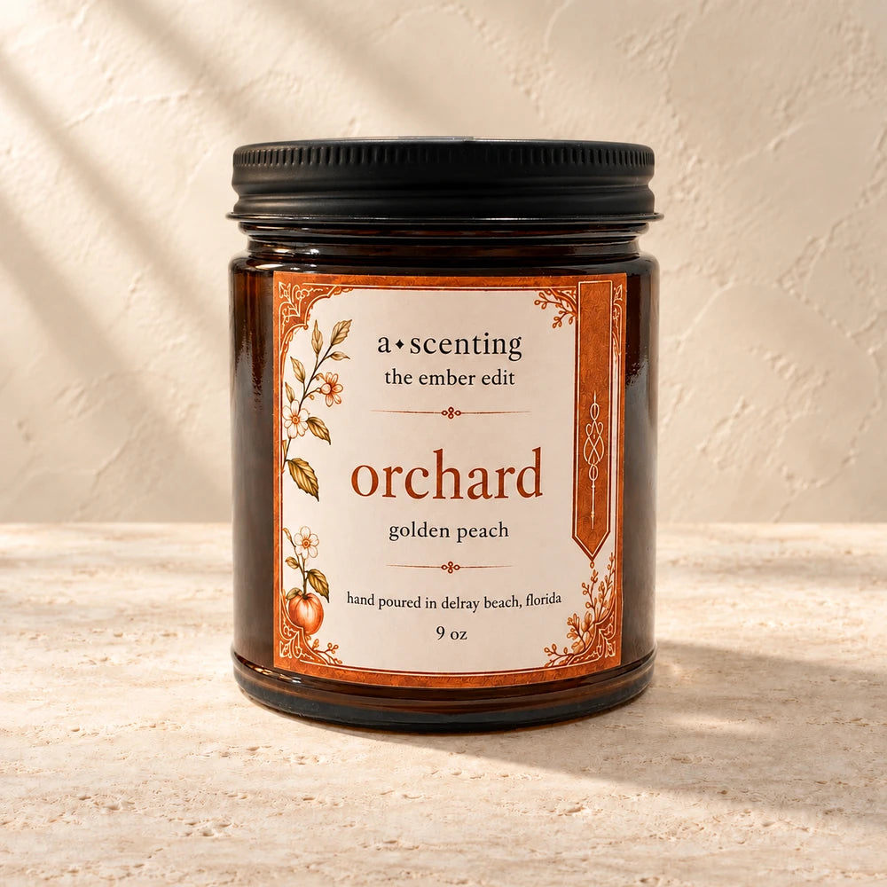Orchard | Golden Peach candle styled on a warm ivory background