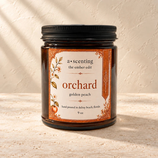 Orchard | Golden Peach candle styled on a warm ivory background