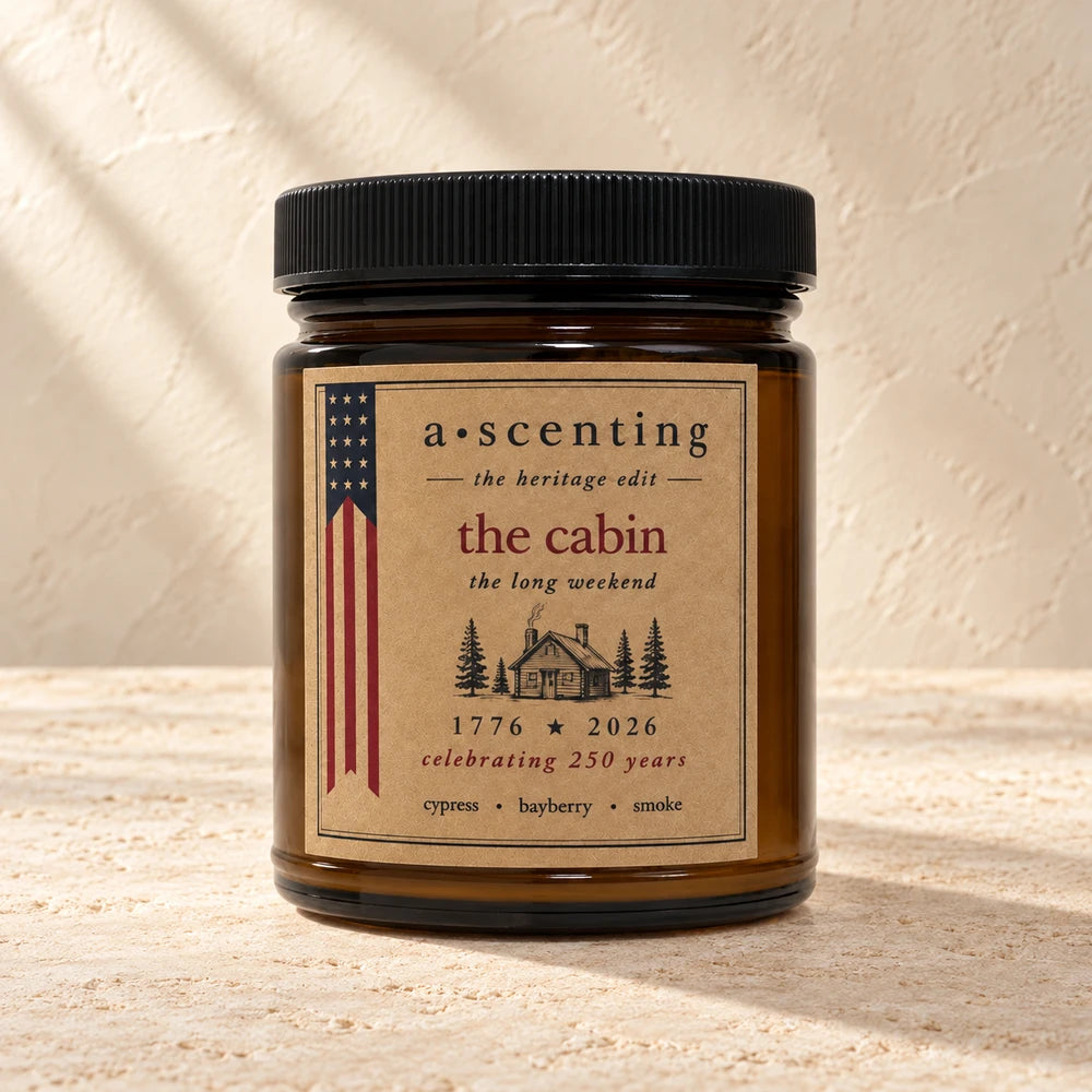 The cabin | Cypress Bayberry & Smoke candle styled on a warm ivory background