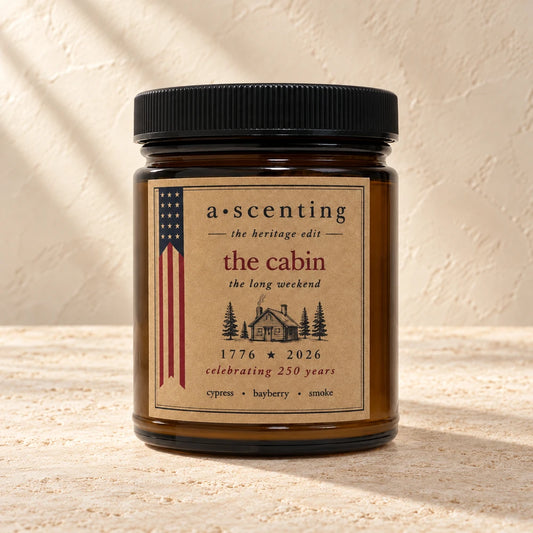 The cabin | Cypress Bayberry & Smoke candle styled on a warm ivory background