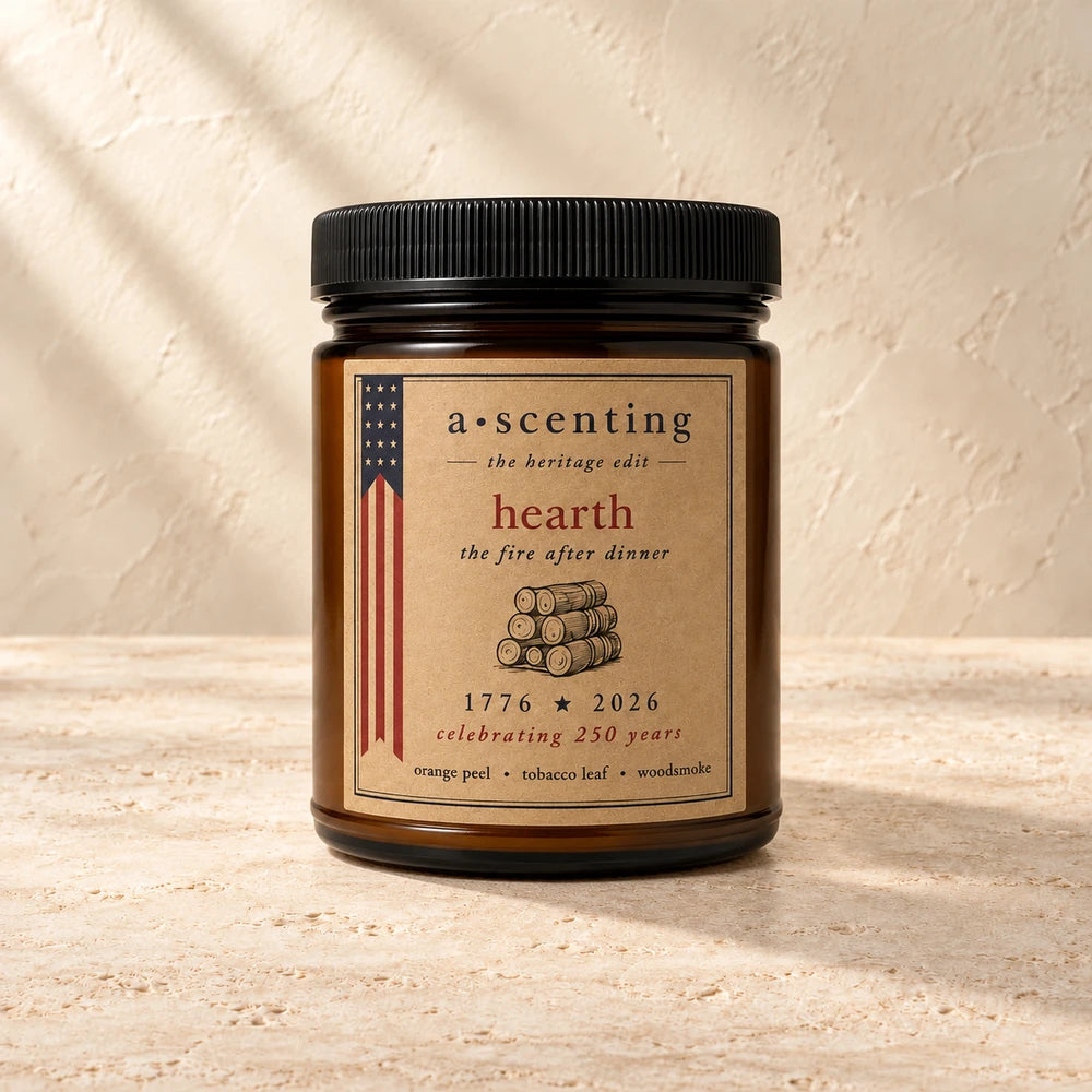 Hearth | Orange peel, Tobacco leaf & Sandalwood candle styled on a warm ivory background