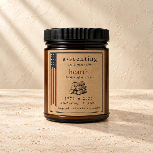 Hearth | Orange peel, Tobacco leaf & Sandalwood candle styled on a warm ivory background