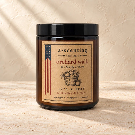 Orchard Walk | Ripe apple & Orange zest candle styled on a warm ivory background