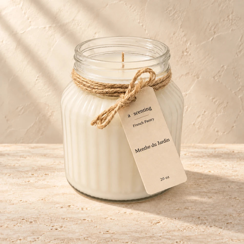 Menthe du Jardin candle styled on a warm ivory background